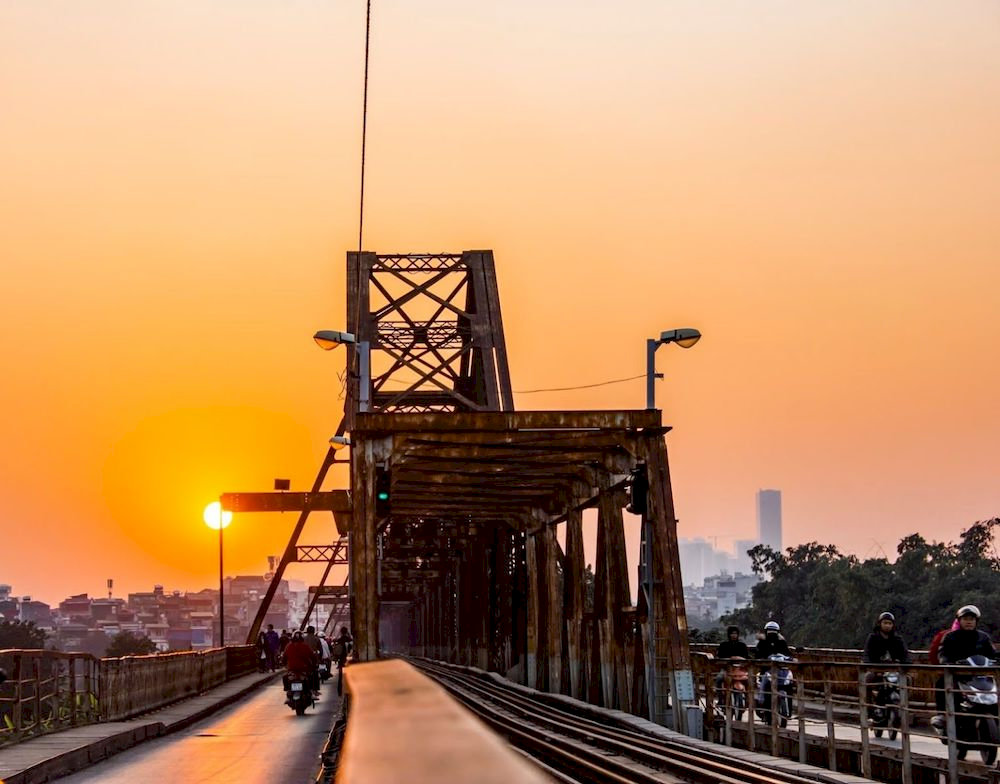 Sunrise or sunset, you can still witness their beauty on Long Bien Bridge Vietnam